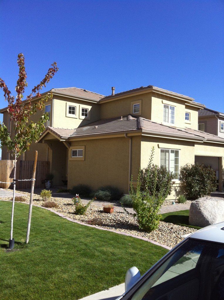 Residential home with aluminum gutter in Nevada desert setting